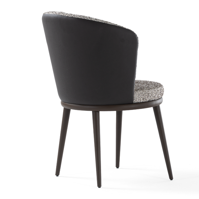 Lipa upholstered dining chair with a wrap-around back